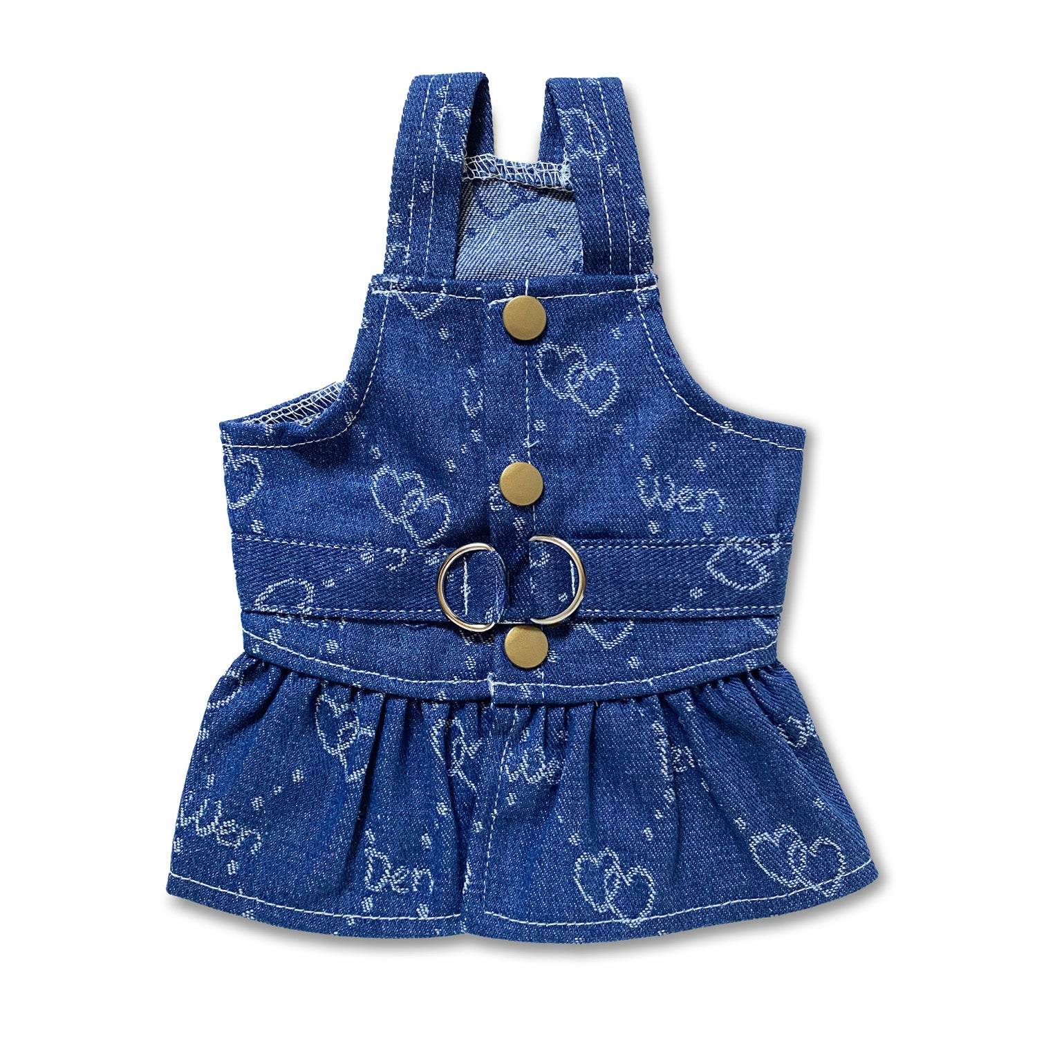 Dog wearing heart-print denim dress harness for stylish, secure walks