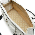 Load image into Gallery viewer, White handbag with quilted beige interior on a white background