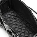 Load image into Gallery viewer, Close-up of a black quilted handbag with a chain detail on a white background
